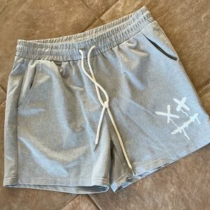 Gray NEWS Shorts with Drawstring and tie & front pockets size small